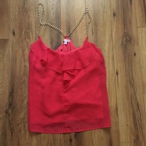 Coral ruffled blouse with gold chain straps